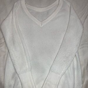 Long white Fall knitted sweater. V neck